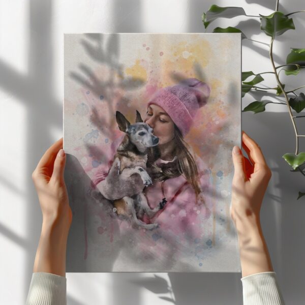 a person holding a picture of a dog